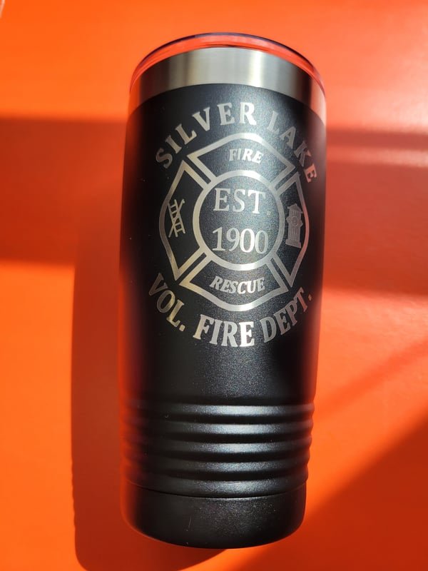 A black tumbler engraved with the Silver Lake Fire Rescue Est. 1900 maltese-cross crest.
