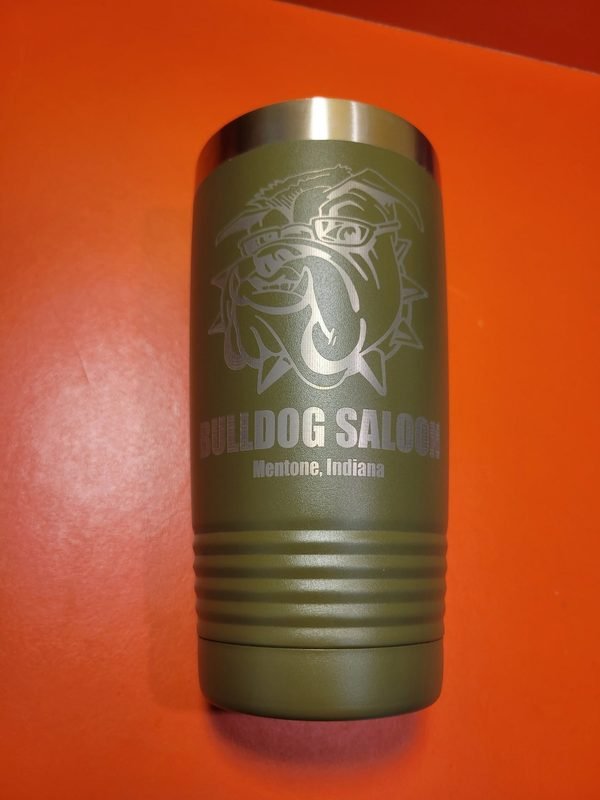 An olive can cooler engraved with a bulldog mascot reading Bulldog Saloon, Mentone, Indiana.