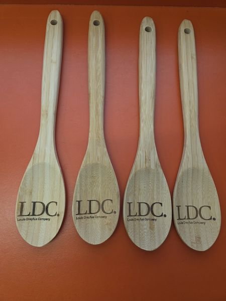 Four bamboo spoons engraved with the LDC Louis Dreyfus Company logo across the bowl.